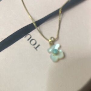 Tous mother pearl pendant.